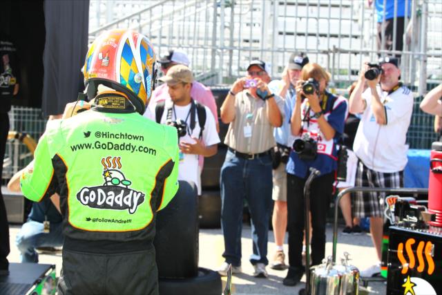 James Hinchcliffe prepares for practice as eager photographers snap away -- Photo by: Chris Jones