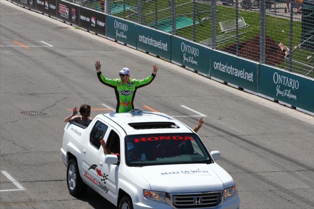 James Hinchcliffe waives to his hometown crowd during pre-race festivities -- Photo by: Chris Jones