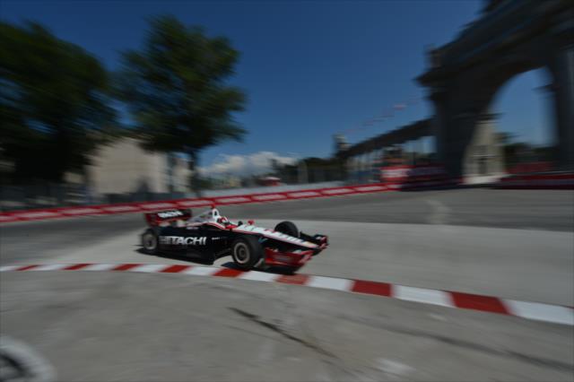 Helio Castroneves enters Turn 1 under the Princes Gate in Toronto -- Photo by: John Cote