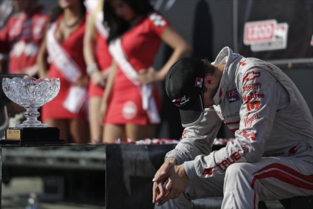 Sebastien Bourdais has a quiet moment of reflection after his second-consecutive podium in Toronto -- Photo by: Shawn Gritzmacher