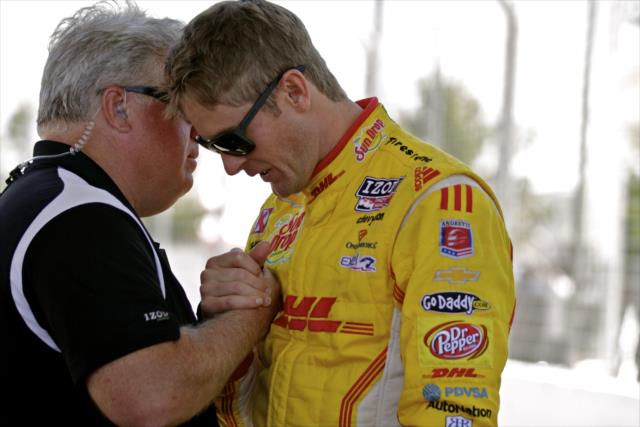 Ryan Hunter-Reay shares a private moment with Chaplain Bob Hills of INDYCAR Ministries -- Photo by: Shawn Gritzmacher