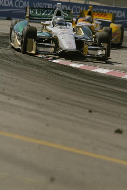 Ed Carpenter and Ryan Hunter_Reay exit Turn 9 in Toronto -- Photo by: Shawn Gritzmacher