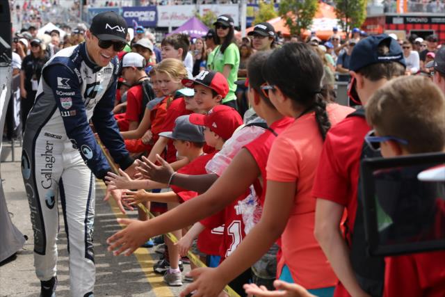 Max Chilton greets the Toronto fans during pre-race introductions for the Honda Indy Toronto -- Photo by: Chris Jones