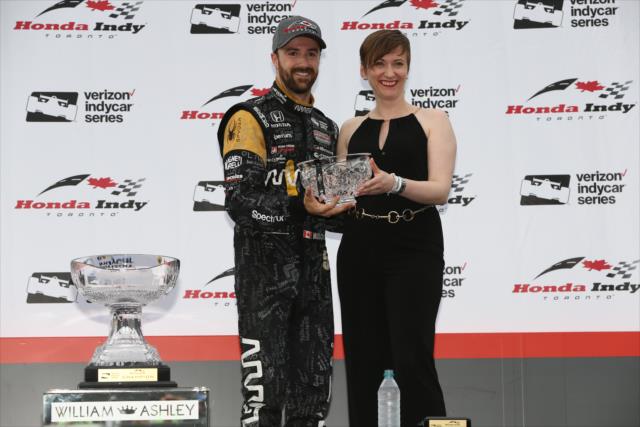 James Hinchcliffe accepts his 3rd Place trophy in Victory Circle following the 2017 Honda Indy Toronto -- Photo by: Chris Jones