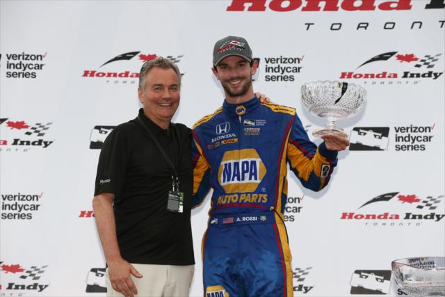 Alexander Rossi accepts his 2nd Place trophy in Victory Circle following the 2017 Honda Indy Toronto -- Photo by: Chris Jones