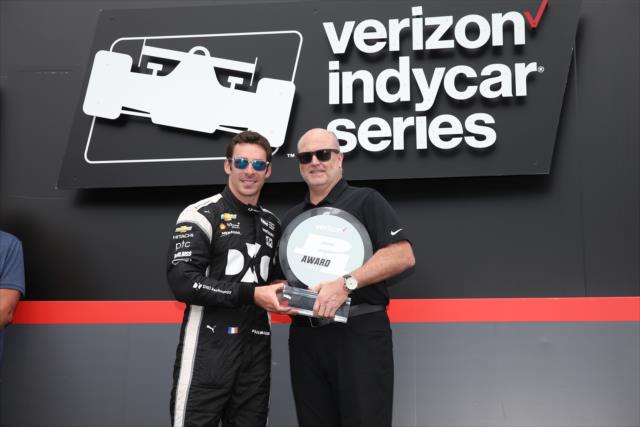 Simon Pagenaud accepts the Verizon P1 Award for winning the pole position for the Honda Indy Toronto -- Photo by: Chris Jones