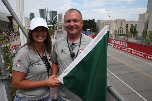 Honda representatives ready to waive the green flag to start the Honda Indy Toronto -- Photo by: Chris Jones