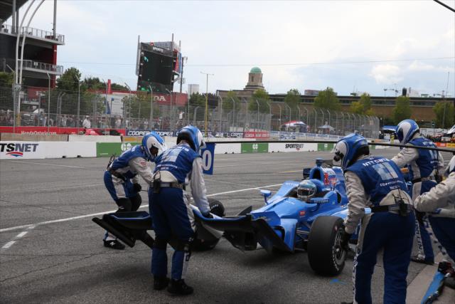 Tony Kanaan comes in for a new nosecone and fuel on pit lane during the Honda Indy Toronto -- Photo by: Chris Jones