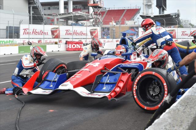 Carlos Munoz comes in for tires and fuel on pit lane during the Honda Indy Toronto -- Photo by: Chris Owens