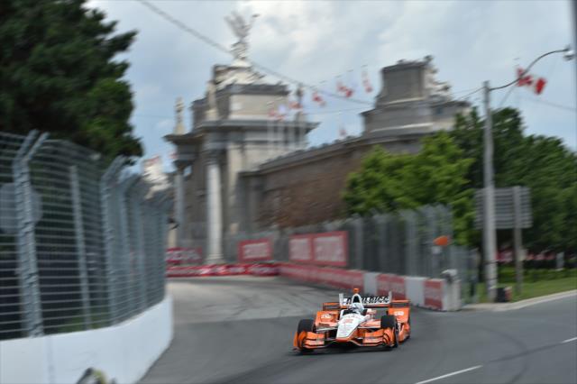 Josef Newgarden dives into Turn 2 during the Honda Indy Toronto -- Photo by: Chris Owens