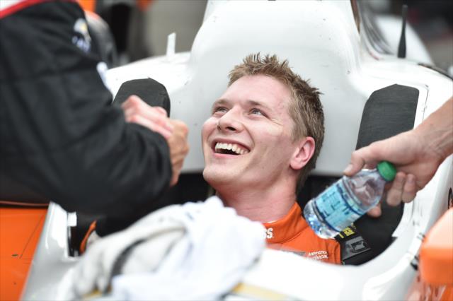 Josef Newgarden gets congratulations from his team after pulling into Victory Circle following his win in the Honda Indy Toronto -- Photo by: Chris Owens
