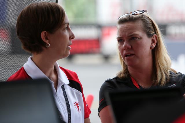 Sarah Fisher chats with Firestone's Lisa Boggs on pit lane during the final warmup for the Honda Indy Toronto -- Photo by: Joe Skibinski