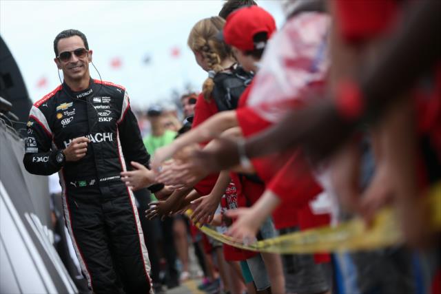 Helio Castroneves greets the fans during pre-race introductions for the Honda Indy Toronto -- Photo by: Joe Skibinski