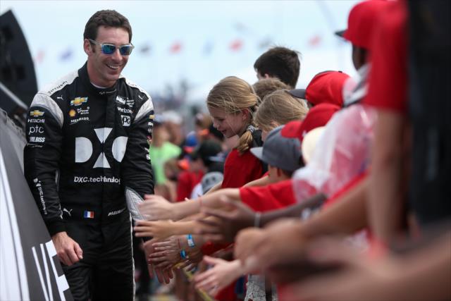 Simon Pagenaud greets the fans during pre-race introductions for the Honda Indy Toronto -- Photo by: Joe Skibinski