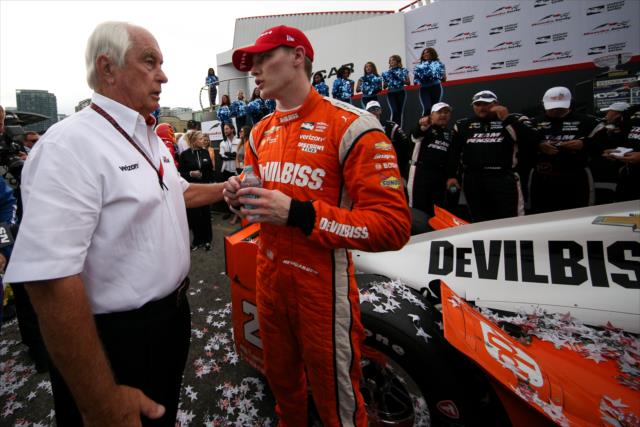 Josef Newgarden chats with team owner Roger Penske in Victory Circle after winning the Honda Indy Toronto -- Photo by: Joe Skibinski