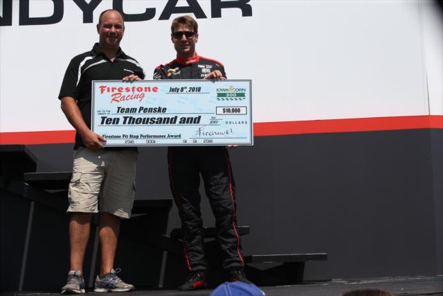 Will Power accepts the Firestone Pit Stop Performance award on behalf of Team Penske for their performance in Iowa -- Photo by: Chris Jones