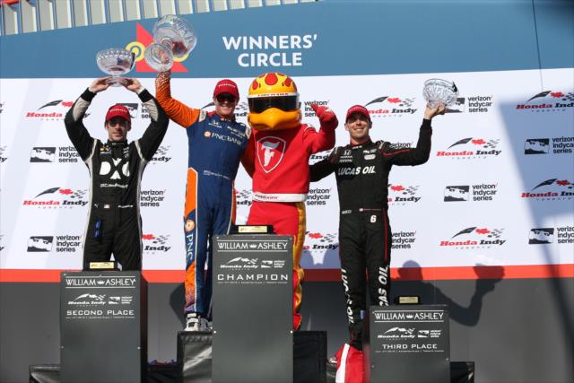 Scott Dixon, Simon Pagenaud, and Robert Wickens with the Firestone Firehawk in Victory Circle following the Honda Indy Toronto -- Photo by: Chris Jones