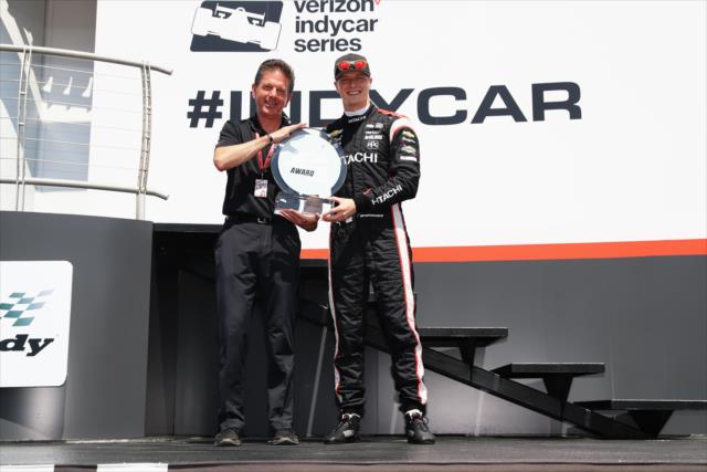Josef Newgarden is presented the Verizon P1 Award for winning the pole position during pre-race festivities for the Honda Indy Toronto -- Photo by: Chris Jones