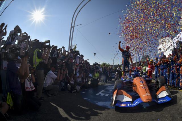 The confetti flies in Victory Circle as Scott Dixon begins the celebration after winning the Honda Indy Toronto -- Photo by: Chris Owens