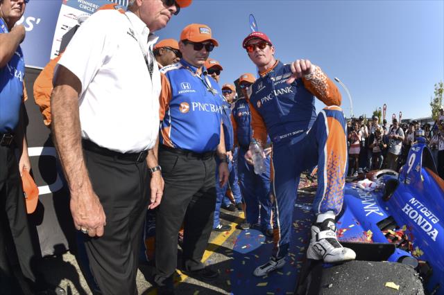 Scott Dixon chats with his team in Victory Circle after winning the Honda Indy Toronto -- Photo by: Chris Owens