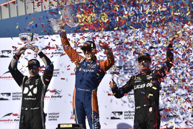The confetti flies over the podium of Scott Dixon, Simon Pagenaud, and Robert Wickens following the Honda Indy Toronto -- Photo by: Chris Owens