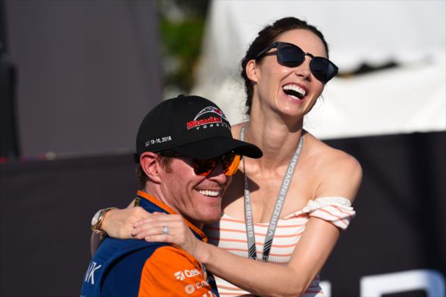Scott Dixon celebrates with his wife, Emma, in Victory Circle after winning the Honda Indy Toronto -- Photo by: James  Black