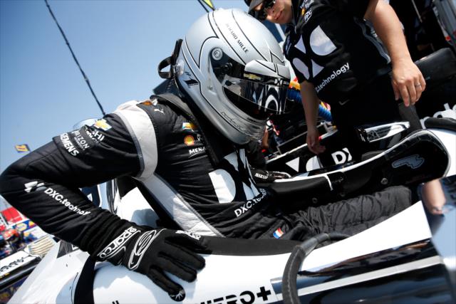 Simon Pagenaud slides into his No. 22 DXC Technology Chevrolet on pit lane prior to the start of the final warmup for the Honda Indy Toronto -- Photo by: Joe Skibinski