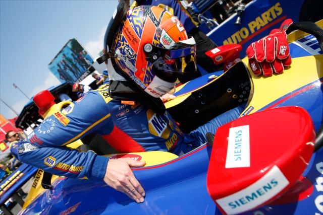 Alexander Rossi slides into his No. 27 NAPA Auto Parts Honda on pit lane prior to the start of the final warmup for the Honda Indy Toronto -- Photo by: Joe Skibinski