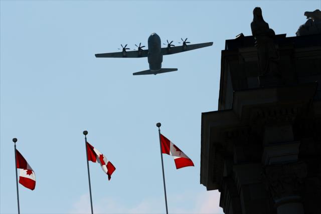 The CC-130J Hercules flies high over the Honda Indy Toronto during pre-race festivities -- Photo by: Joe Skibinski