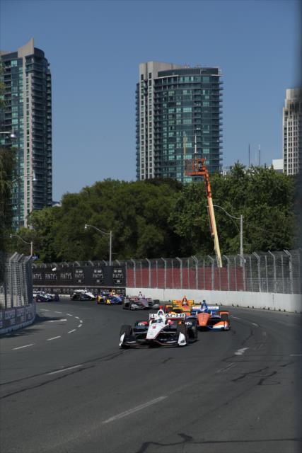 Josef Newgarden leads the field out of Turn 2 onto the backstretch during the start of the Honda Indy Toronto -- Photo by: Matt Fraver