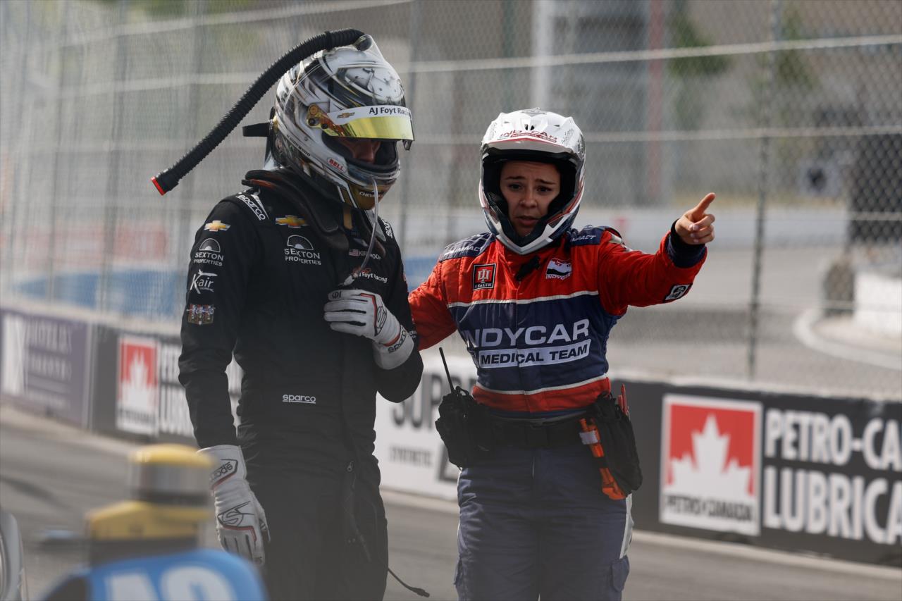 Kyle Kirkwood with Dr. Julia Vaizer - Honda Indy Toronto - By: Joe Skibinski -- Photo by: Joe Skibinski