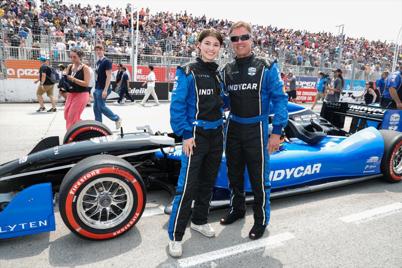 Fastest Seat in Sports rider Ava Rose with Davey Hamilton - Honda Indy Toronto - By: Chris Owens -- Photo by: Chris Owens