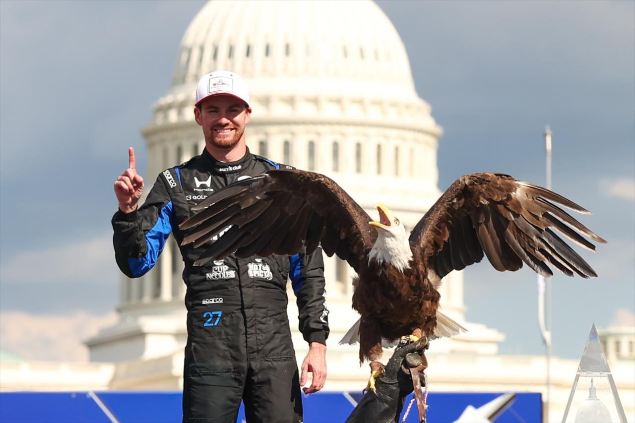 Kyle Kirkwood with bald eagle - Freedom 250 Grand Prix of Washington D.C. - By: Chris Owens -- Photo by: Chris Owens