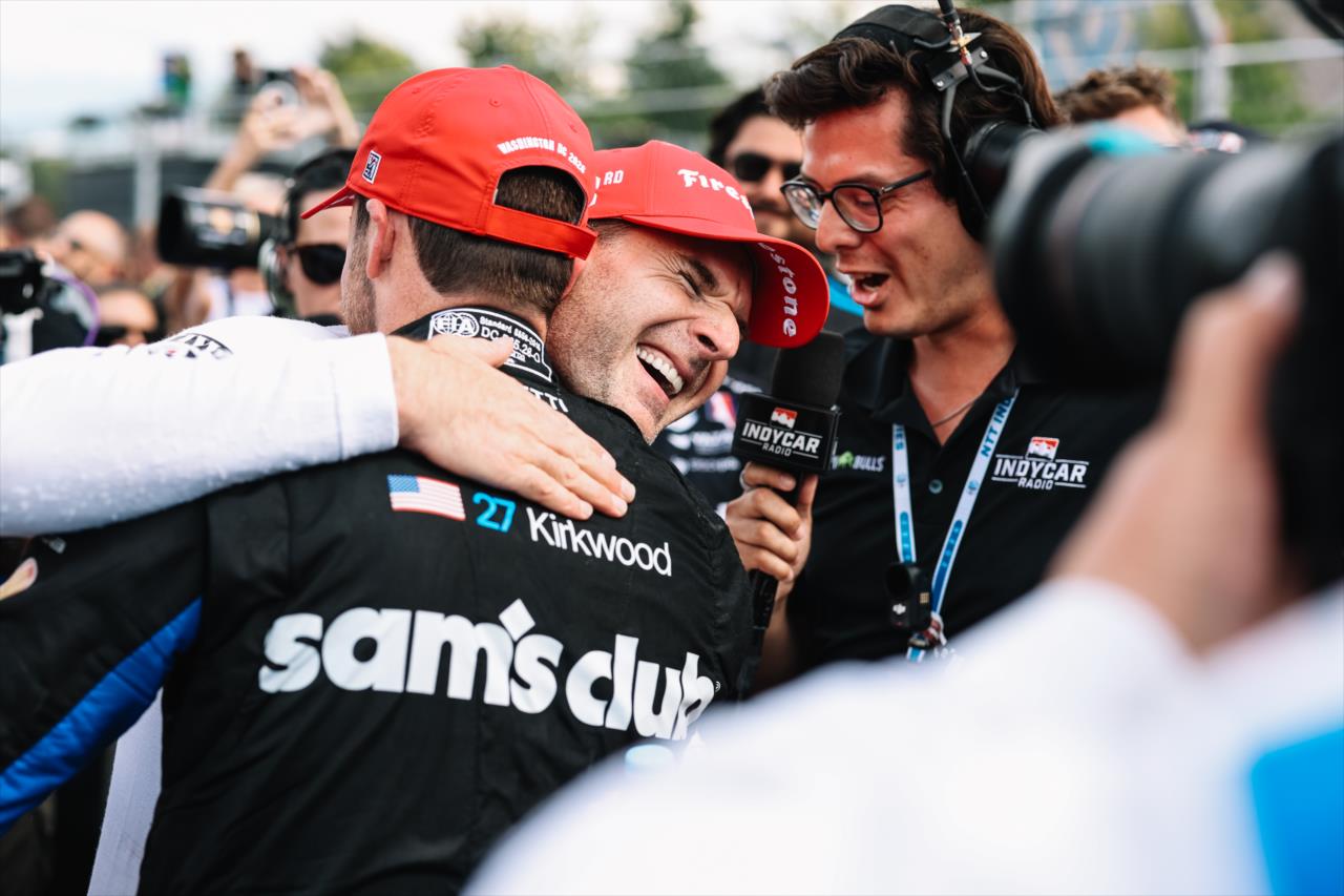 Will Power hugs teammate Kyle Kirkwood - Freedom 250 Grand Prix of Washington D.C. - By: Joe Skibinski -- Photo by: Joe Skibinski