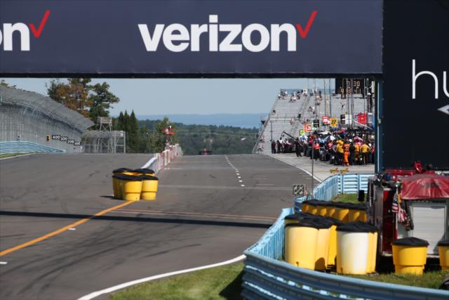 Pit lane starts to come to life prior to practice for the INDYCAR Grand Prix at The Glen at Watkins Glen International -- Photo by: Bret Kelley
