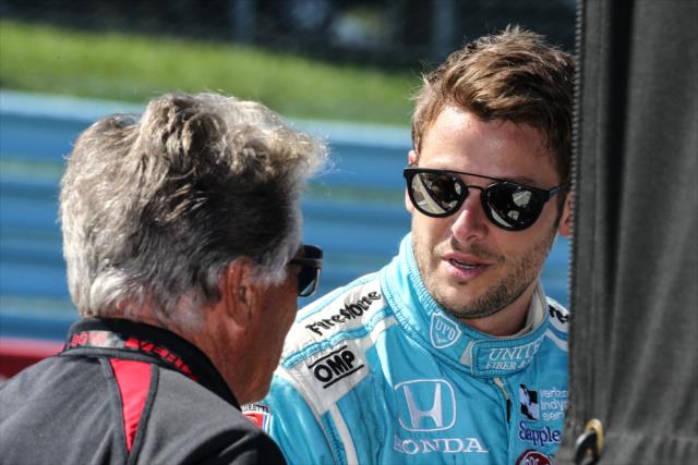 Marco Andretti chats with his grandfather, Mario, in his pit stand prior to qualifications for the INDYCAR Grand Prix at The Glen at Watkins Glen International -- Photo by: Bret Kelley
