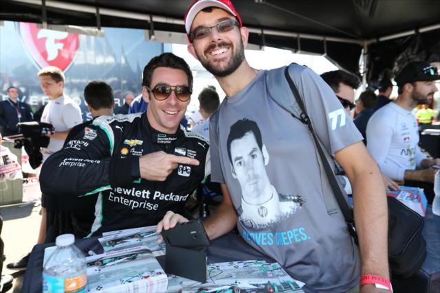 Simon Pagenaud poses for a photograph during the autograph session in the INDYCAR Fan Village at Watkins Glen International -- Photo by: Chris Jones