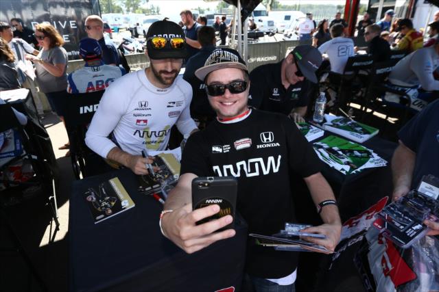 James Hinchcliffe poses for a photograph during the autograph session in the INDYCAR Fan Village at Watkins Glen International -- Photo by: Chris Jones