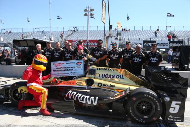James Hinchcliffe accepts the Firestone Pit Stop Performance Award on behalf of Schmidt Peterson Motorsports for their performance at Texas Motor Speedway -- Photo by: Chris Jones