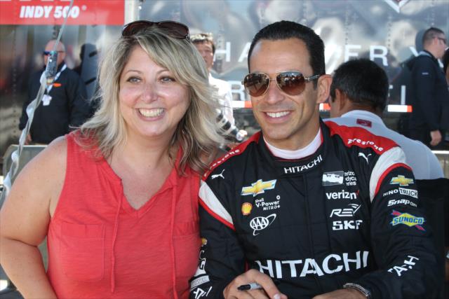 Helio Castroneves poses for a photograph during the autograph session in the INDYCAR Fan Village at Watkins Glen International -- Photo by: Chris Jones