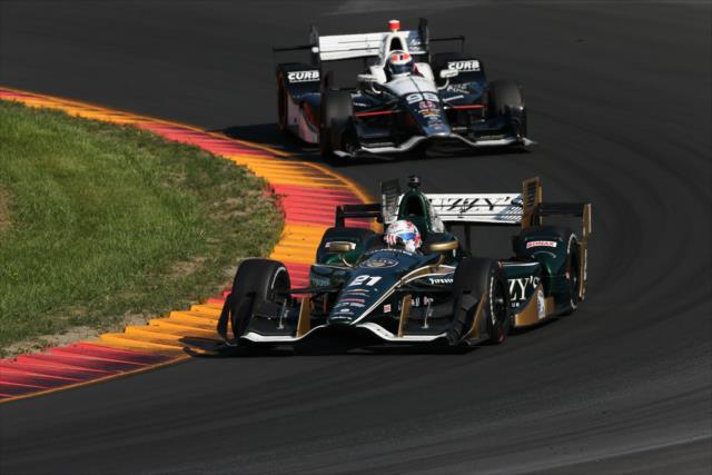 Josef Newgarden and Alexander Rossi apex Turn 7 during the INDYCAR Grand Prix at The Glen from Watkins Glen International -- Photo by: Bret Kelley