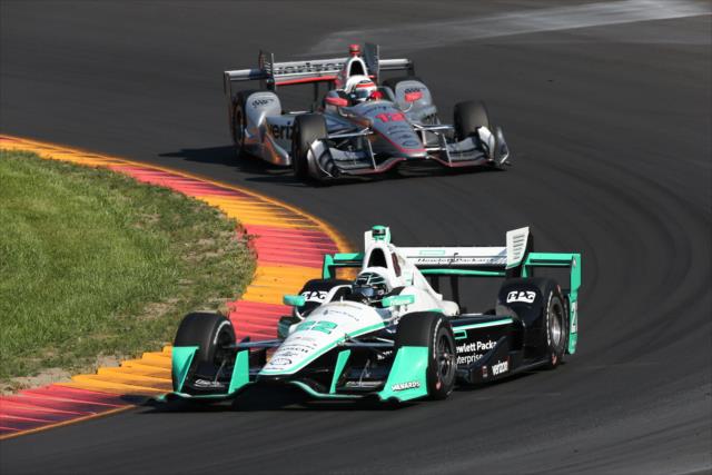 Simon Pagenaud and Will Power roll through Turn 7 during the INDYCAR Grand Prix at The Glen from Watkins Glen International -- Photo by: Bret Kelley