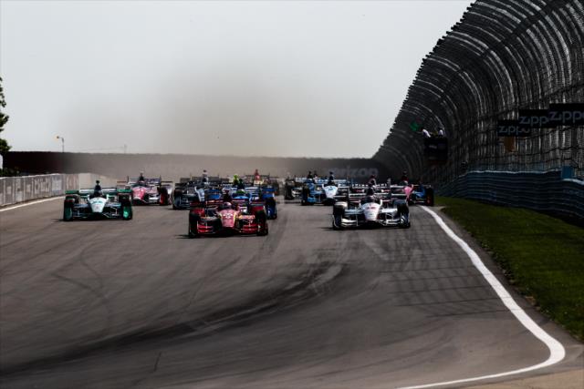 Scott Dixon and Will Power lead the field into Turn 1 during the start of the INDYCAR Grand Prix at The Glen from Watkins Glen International -- Photo by: Bret Kelley