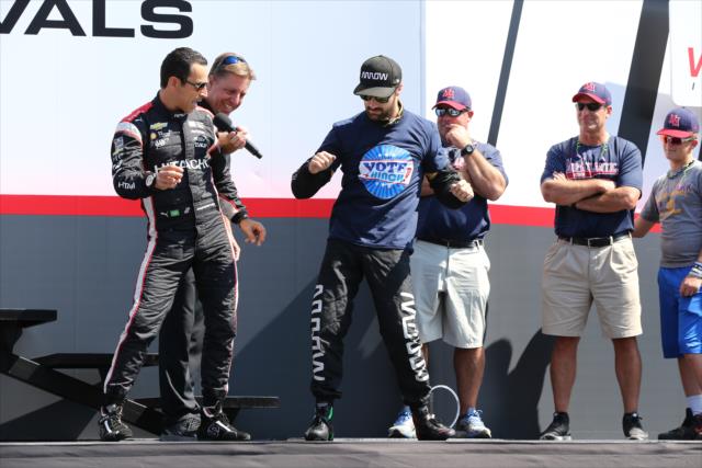 James Hinchcliffe and Helio Castroneves in a quick dance-off during pre-race festivities for the INDYCAR Grand Prix at The Glen from Watkins Glen International -- Photo by: Chris Jones
