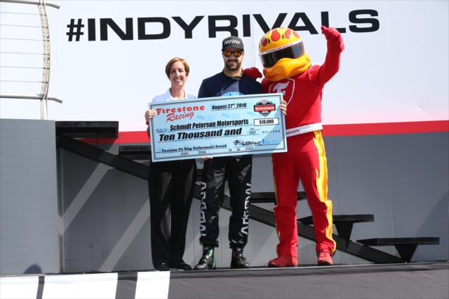 James Hinchcliffe accepts the Firestone Pit Stop Performance Award during pre-race festivities for the INDYCAR Grand Prix at The Glen from Watkins Glen International -- Photo by: Chris Jones