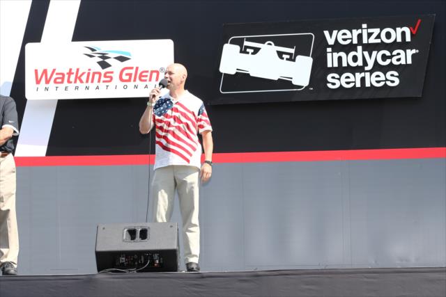 Doug Allen from the Buffalo Sabres performs the National Anthem during pre-race festivities for the INDYCAR Grand Prix at The Glen from Watkins Glen International -- Photo by: Chris Jones
