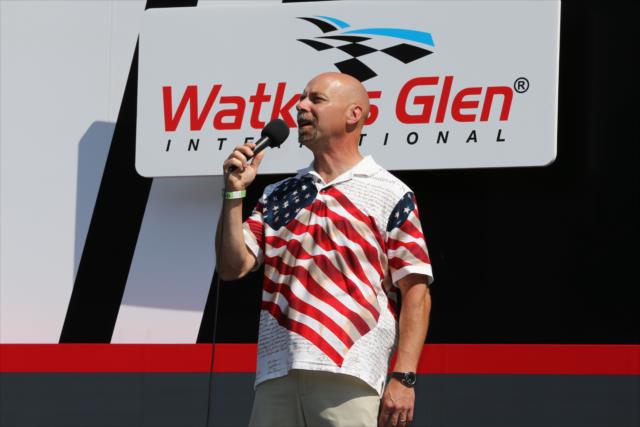 Doug Allen of the Buffalo Sabres performs the National Anthem during pre-race festivities for the INDYCAR Grand Prix at The Glen from Watkins Glen International -- Photo by: Chris Jones