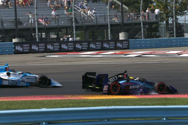 Spencer Pigot dives under Marco Andretti into Turn 1 during the INDYCAR Grand Prix at The Glen from Watkins Glen International -- Photo by: Chris Jones