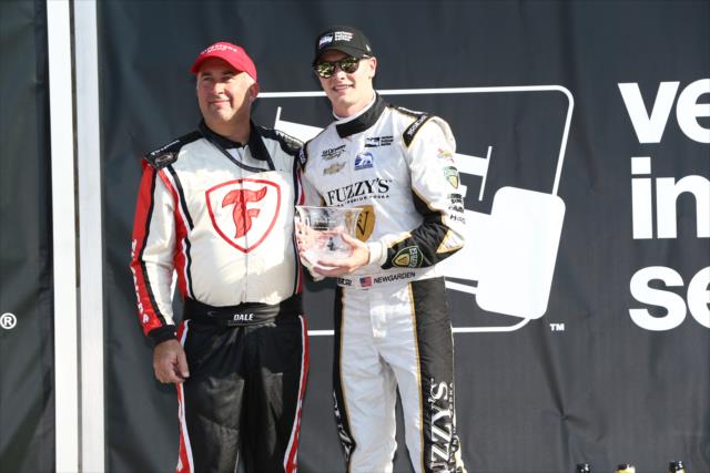 Josef Newgarden accepts his 2nd Place trophy in Victory Lane following the INDYCAR Grand Prix at The Glen from Watkins Glen International -- Photo by: Chris Jones