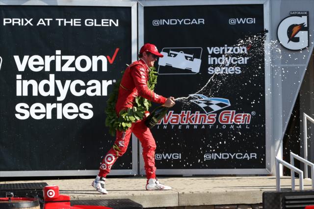 Scott Dixon sprays the champagne in Victory Lane following the INDYCAR Grand Prix at The Glen from Watkins Glen International -- Photo by: Chris Jones